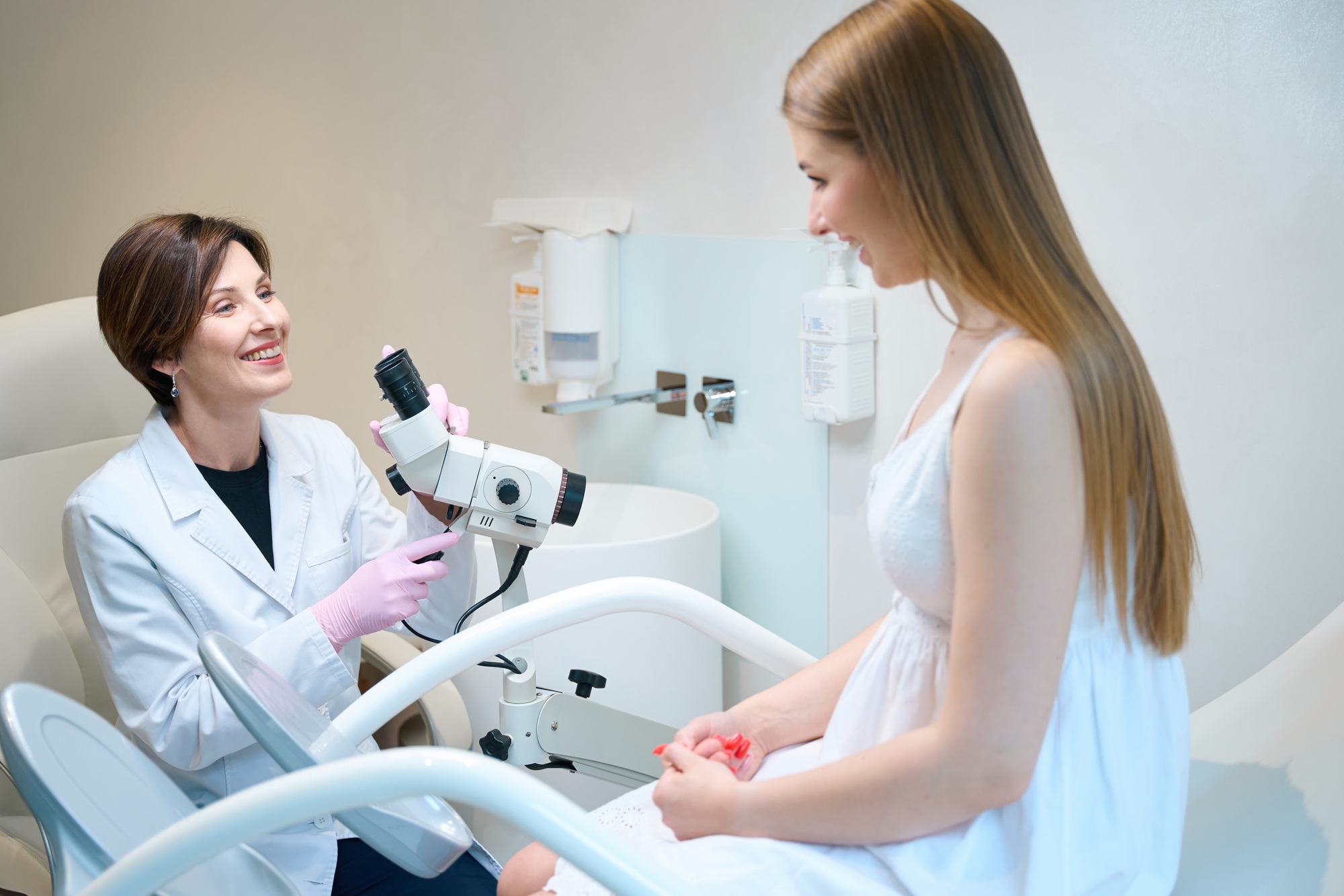 Gynecologist uses a gynecological microscope in her work