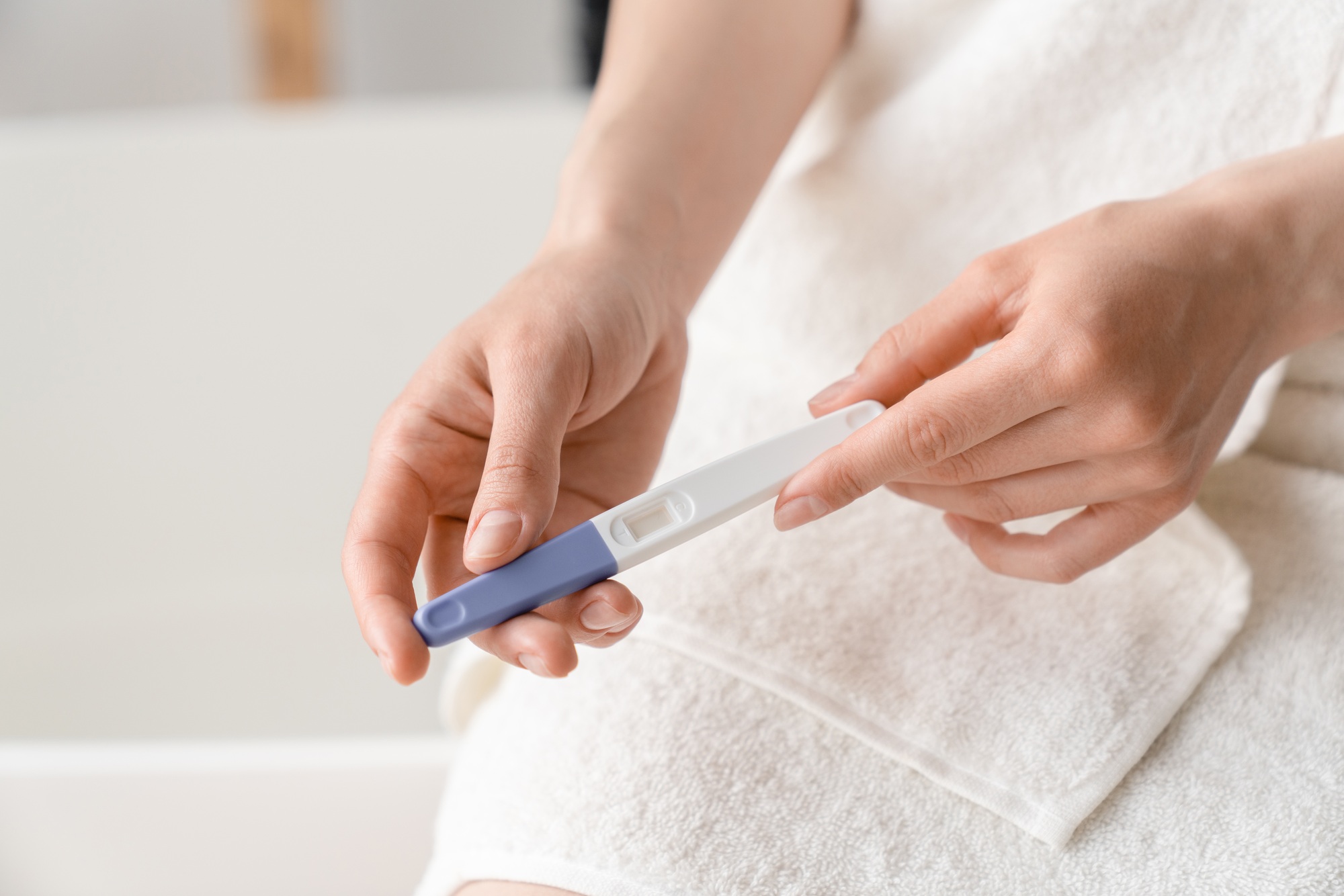 Positive negative pregnancy test result. Abortion, adoption, invitro fertilization concept.